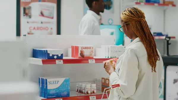 Young Woman Checking Box Pills Medical Shop Looking Medicaments Pharmaceutical — Stock Photo, Image