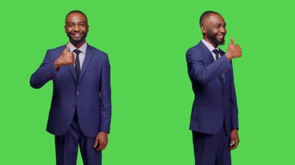 Male Employee Showing Thumbs Sign Camera Expressing Approval Greenscreen Backdrop — Stock Video