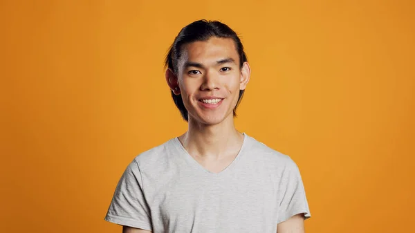 Cheerful Smiling Guy Posing Orange Background Young Man Being Confident —  Fotos de Stock