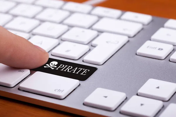 Finger Pressing Black Pirate Button Illegal Dowload Torrent — Stock Photo, Image