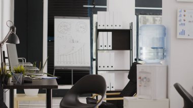 Business offices with computers for creative occupation, empty boardroom open space used for people with corporate jobs. Digital agency workspace with professional workstations.