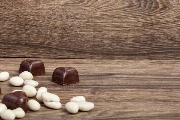 Verschiedene Arten Von Früchten Schokolade Auf Holzgrund — Stockfoto