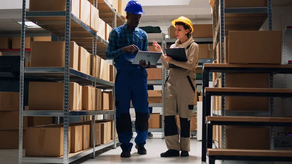 Two Depot Workers Doing Inventory Warehouse Goods Looking Boxes Filled — Stock Photo, Image