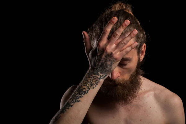 stock image Portrait of cool bearded hipster on black background in studio photo. Expression and fashion