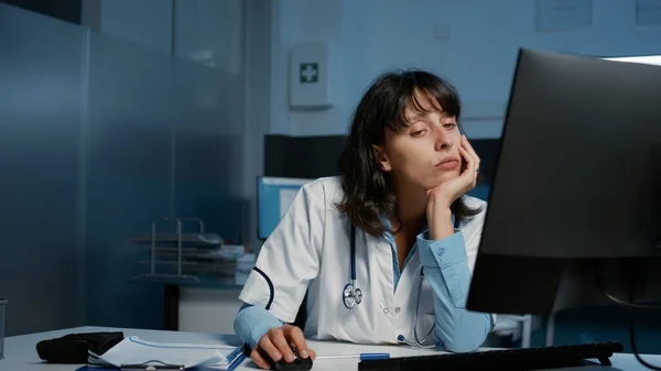 Exhausted Stressed Practitioner Doctor Working Late Night Hospital Office Typing — Stock Photo, Image