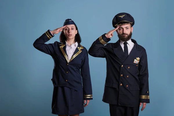 Airplane Pilot Flight Attendant Saluting Portrait Airplane Crew Professional Uniform — Stock Photo, Image