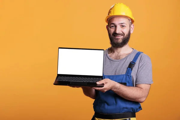 Smiling Construction Worker Holding Laptop Empty White Screen Advertising Renovation — Stock Photo, Image