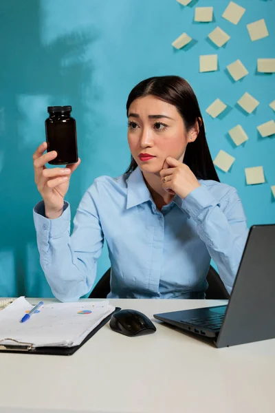 Professional Asian Startup Employee Headache Looking Bottle Pills Analyzing Components — Stock Photo, Image
