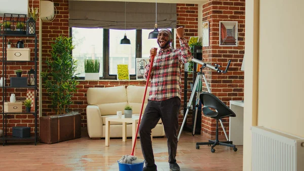 African American Man Mopping Apartment Floor Clean Dust Using Mop — Stock Photo, Image