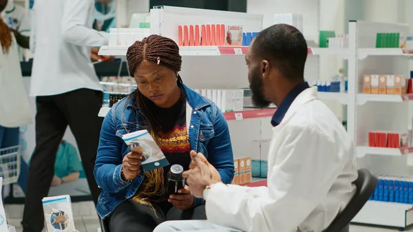 Drugstore Employee Recommending Medicine Client Talking Prescription Treatment Vitamins Drugs — Stock Photo, Image