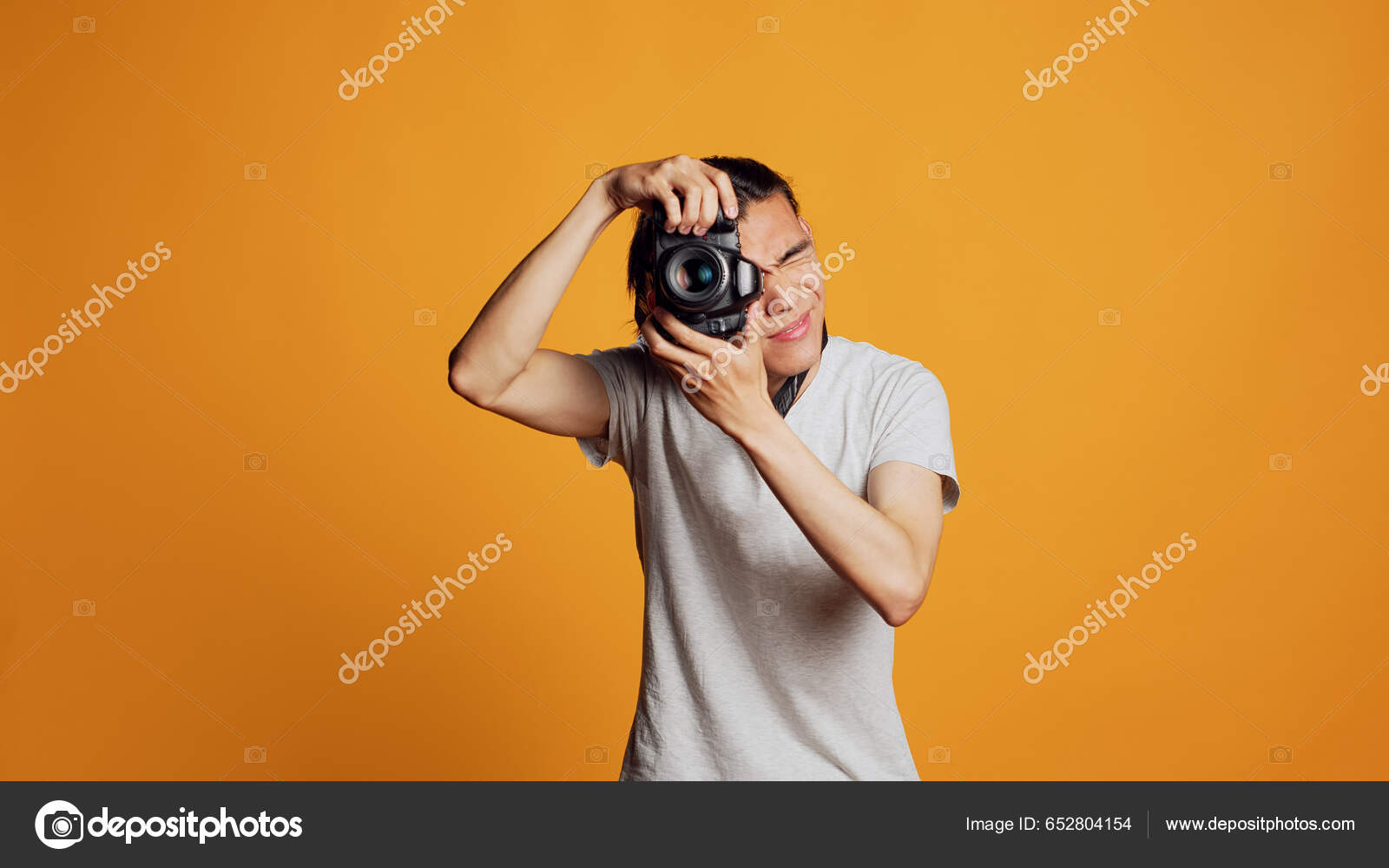 Young Professional Photographer Using Dslr Camera Take Pictures