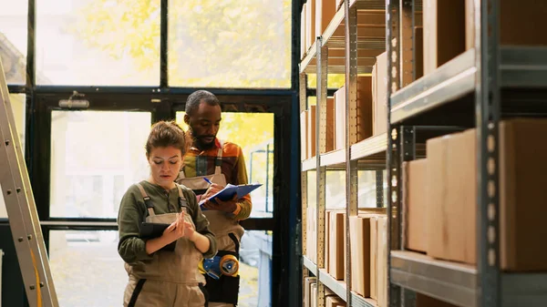 Diverse People Examining Production Warehouse Using Inventory List Tablet Prepare — Stock Photo, Image