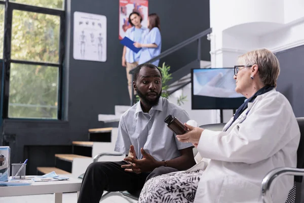 Elderly Physician Medic Discussing Health Care Treatment Patient While Showing — Stock Photo, Image