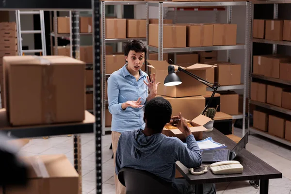 Diverse Warehouse Workers Discussing Distribution Logistics Problem While Preparing Customer — Stock Photo, Image