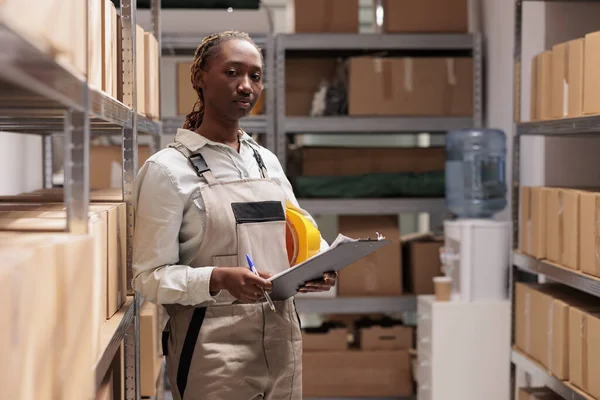 Serious Delivery Service Worker Tracking Inventory Warehouse Portrait African American — Stock Photo, Image