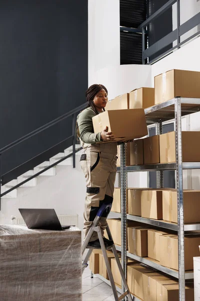 African American Worker Holding Carton Box Checking Customer Shipping Details — Stock Photo, Image