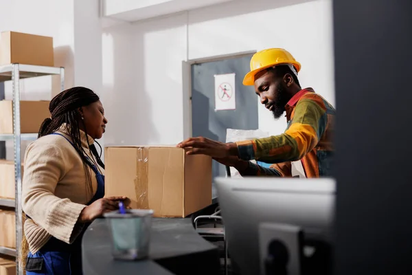 Warehouse Reception Worker Inspecting Received Cardboard Box Packing Transportation African — Stock Photo, Image