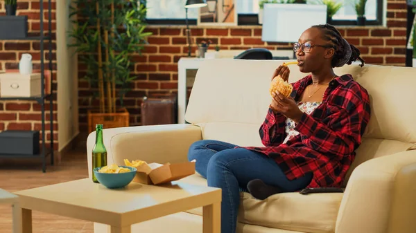 Smiling Adult Eating Hamburger Fries Alcohol Watching Favorite Action Movie — Stok fotoğraf