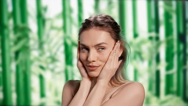Gentle Beauty Model Applying Face Cream Camera Posing Skincare Routine — 图库照片