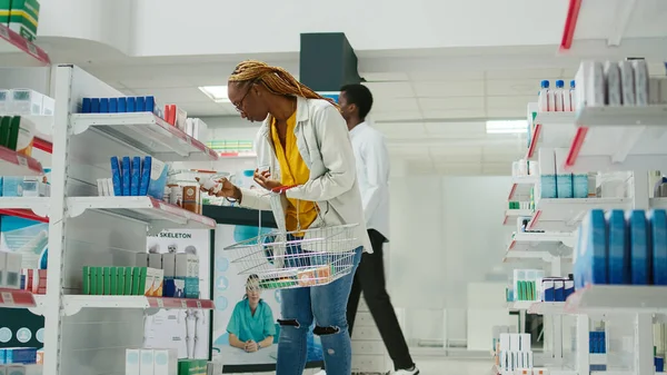 African American Woman Taking Pills Vitamins Shelves Looking Medicaments Boxes — Stock Photo, Image