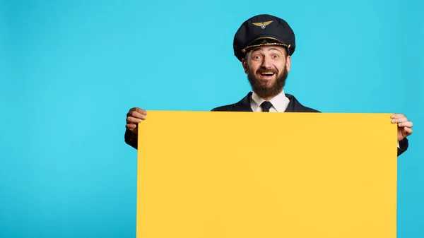 Cheerful Commercial Pilot Showing Empty Mockup Board Camera Working Advertisement — Fotografia de Stock