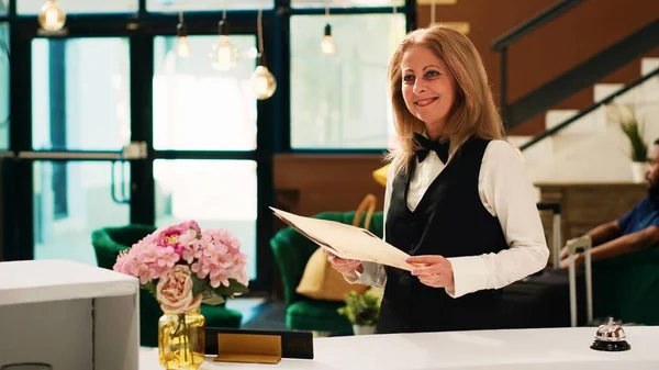 Hotel Receptionist Looking Reservations Working Front Desk Help Clients Tourists — Stock Photo, Image