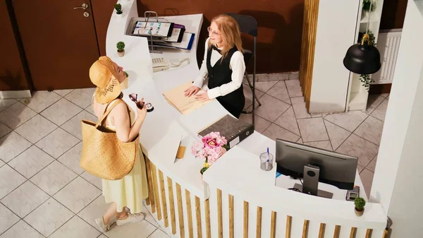 Hotel Concierge Welcoming Female Traveller Bellboy Taking Her Luggage Front — Stock Photo, Image