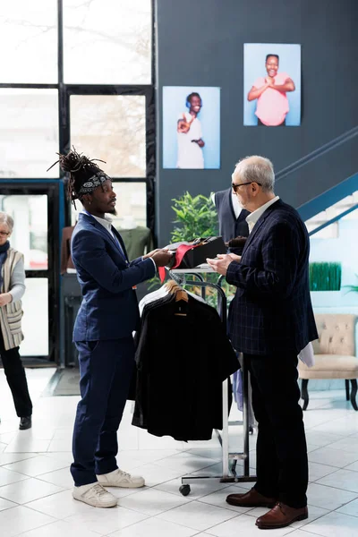 African American Employee Helping Client Formal Outfit Checking Tie Fabric — Stock Photo, Image