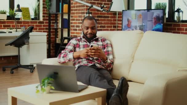 Cozy African American Man Chatting Online Friends Phone Warm Stylish — Stock Video