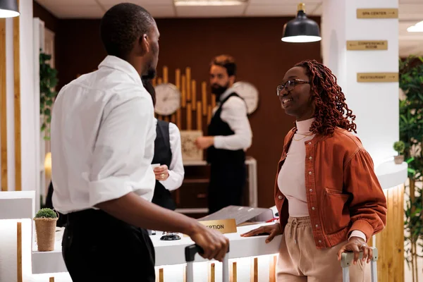 Partners Arriving Hotel Front Desk Trolley Bags Talking Reception Staff — Stock Photo, Image