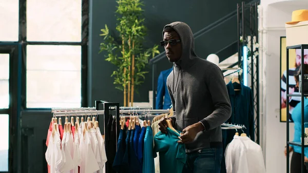 African American Robber Stealing Trendy Clothes Modern Boutique Being Caught — Stock Photo, Image