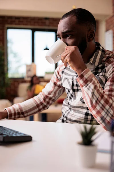 African American Programmer Drinking Coffee Tea While Reading Emails Computer — Stock Photo, Image