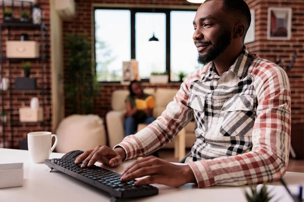 Smiling African American Freelancer Working Remote Typing Looking Computer Screen — Stock Photo, Image