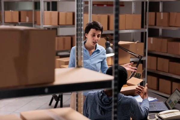 Diverse Warehouse Employees Discussing Transportation Logistics Problem While Preparing Customer — Stock Photo, Image