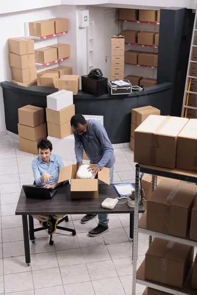 Top View Employees Looking Cargo Stock Laptop Computer While Putting — Stock Photo, Image