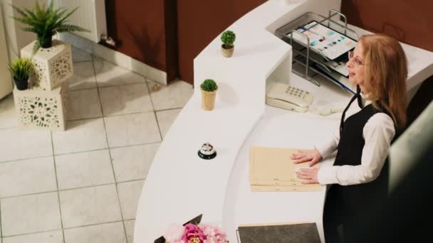 African American Guest Checking Hotel Reception Employee Receptionist Providing Excellent — Stock Video