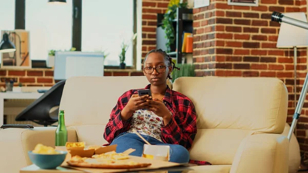 African American Girl Browsing Internet Smartphone Watching Favorite Show Home — Stock Photo, Image