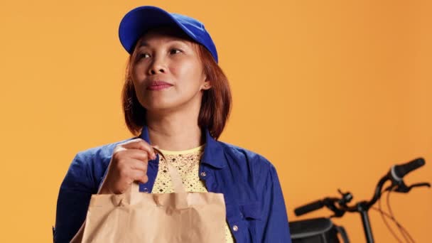 Close Slow Motion Shot Smiling Courier Handing Meal Bag Client — Stock Video