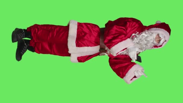Vertical Video Side View Santa Claus Cosplay Works Phone Greenscreen — Stock Video