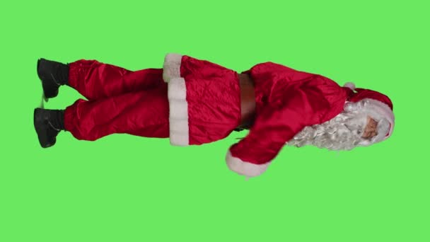 Verticale Video Achteraanzicht Van Kerstman Die Gebaar Maakt Met Handen — Stockvideo