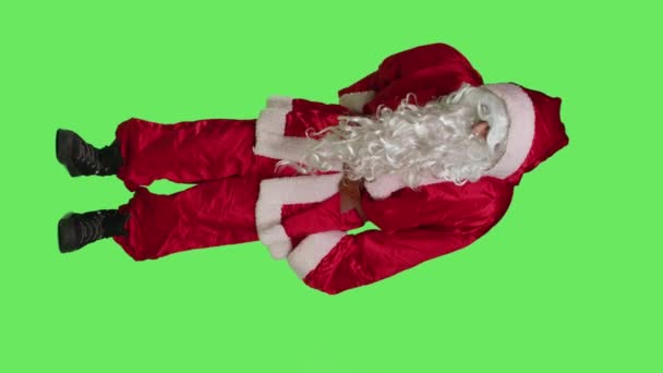 Vertical Video Front View Santa Suffers Back Pain Studio Feeling — Stock Video