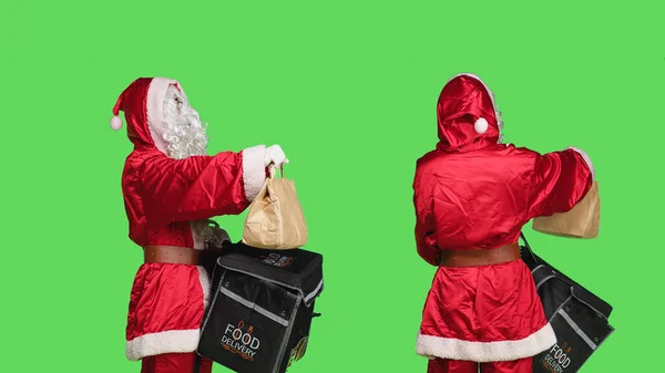 Man Festive Costume Backpack Delivering Food Greenscreen Background Joyful Santa — Stock Photo, Image