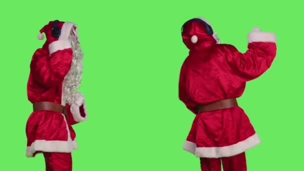 Joyful Santa Dancing Songs Studio Using Headset Listen Music Spread — Stock Video
