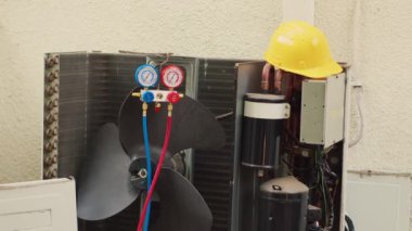 Close up zoom in shot of defective manometers used for checking HVAC system refrigerant pressure, in need of mending. Set of barometer high or low freon levels benchmarking air conditioner component