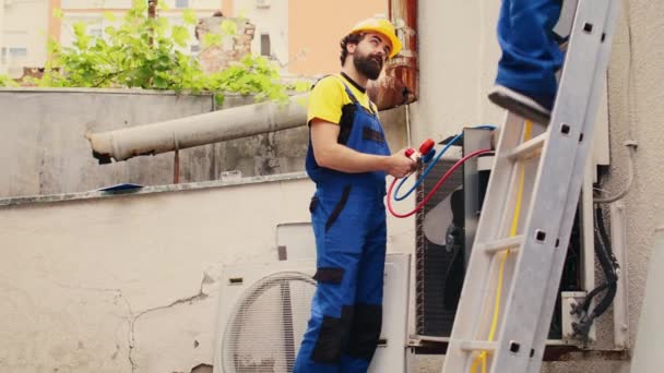 Competent Mechanic Holding Electric Hand Drill Stepping Folding Ladder Finishing — стокове відео