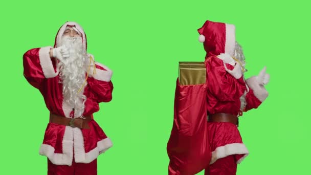 Санта Робить Великі Пальці Вгору Великі Пальці Вниз Зеленому Тлі — стокове відео