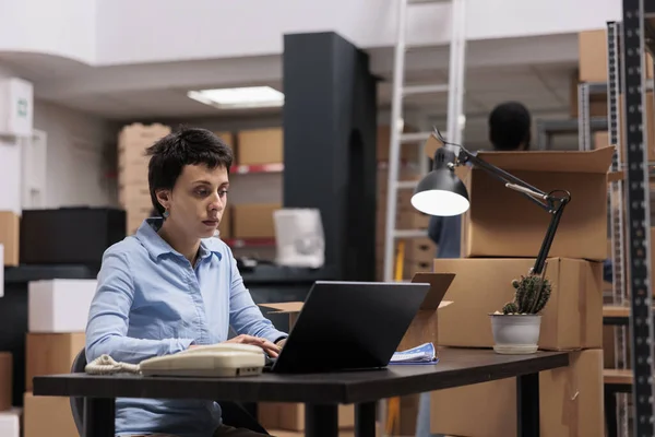 Storehouse Employee Looking Cargo Stock Laptop Computer While Checking Shipping — Stock Photo, Image