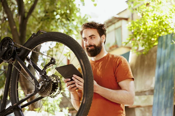 Outdoor Active Vibrant Caucasian Man Exploring Internet Bike Maintenance Committed — Stock Photo, Image