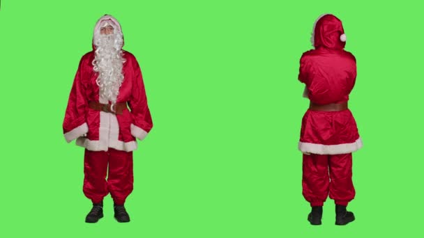 카메라에 스크린 빨간색 의상에 코스프레 크리스마스 정신을 모자와 안경으로 유명한 — 비디오