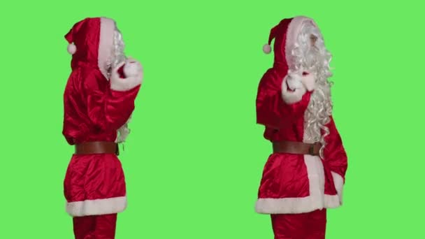 Saint Nick Cosplay Showing Sign Camera Advertising Negativity While Dressed — Stock Video